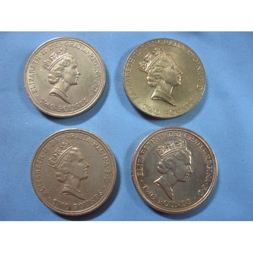 55K - 4 x uni-metallic old-style £2 coins comprising 1986 XIII Commonwealth Games, 1995 Peace Dove, 1996 E... 