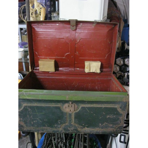 198 - A large metal storage trunk containing O gauge track and accessories including points, engine shed, ... 