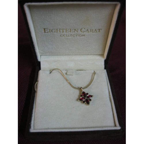 30 - Eighteen carat collection 14 inch chain with a four petal pendant.
Pendant approx 1 cms square