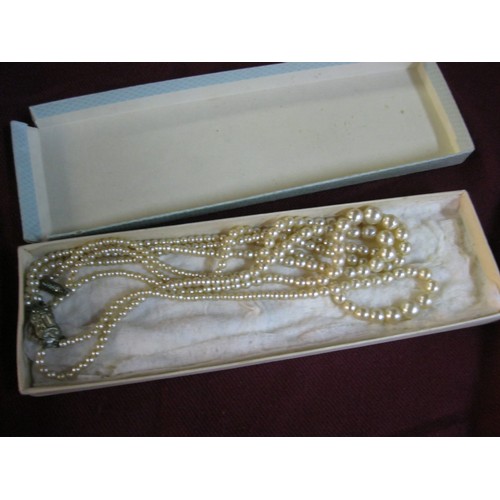 37 - 2 Vintage Pearl necklaces approx 16 inches long .One is a single string the other three string .
Bea... 