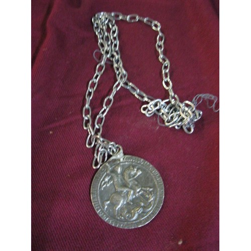 35 - A unmarked  Pendant St George killing the Dragon on one side and a lady on the other side (similar t... 