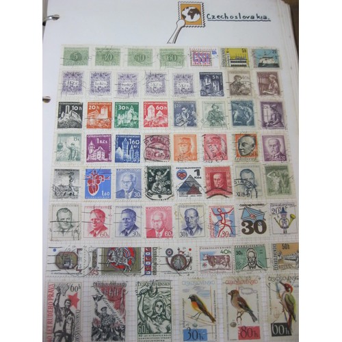 207 - A Stanley Gibbons stamp album containing world stamps