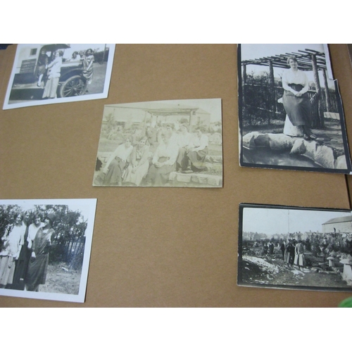 260 - A photograph album containing mainly snapshots but also some military pictures including WW1 & WW2 s... 