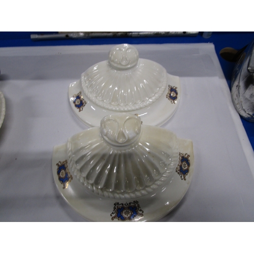 132 - Two wall plinths or display plinths cast in porcelain with transfer decoration .Both in good general... 