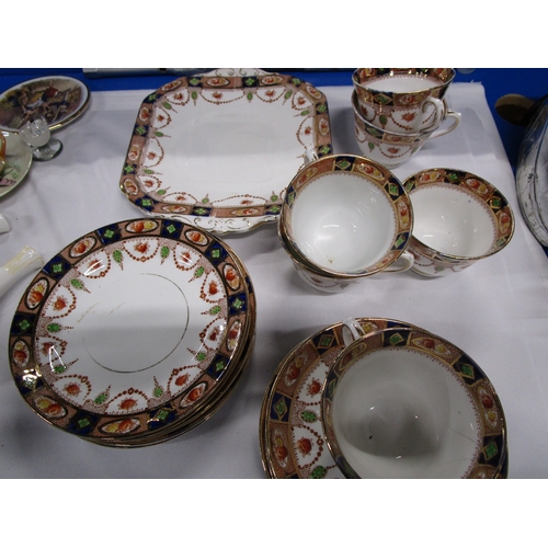 139 - A Teaset consisting of a cake plate 6side plates and six cups and saucers along with 5 Ironstone chi... 