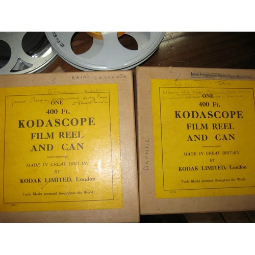 343 - A selection of film reels, several in tins, various sizes