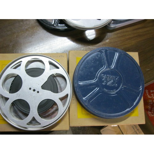 343 - A selection of film reels, several in tins, various sizes