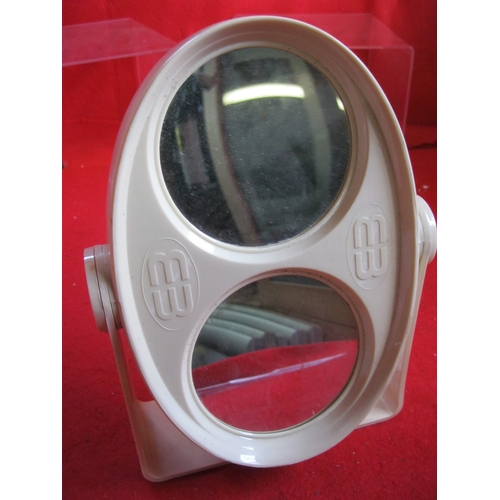 364 - A vintage 1960s plastic framed, double-sided tabletop or wall-mounting vanity mirror in good order