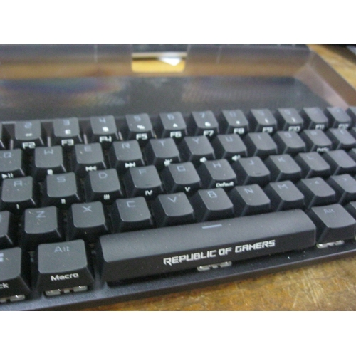 371 - A Republic of Gamers wireless keyboard and a Gamory Wireless Pro game controller, boxed