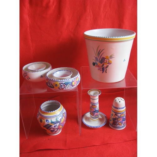 107 - 2 pieces of EE pattern Poole Pottery sugar shaker and 6 inch footed candlestick along with an ED pat... 