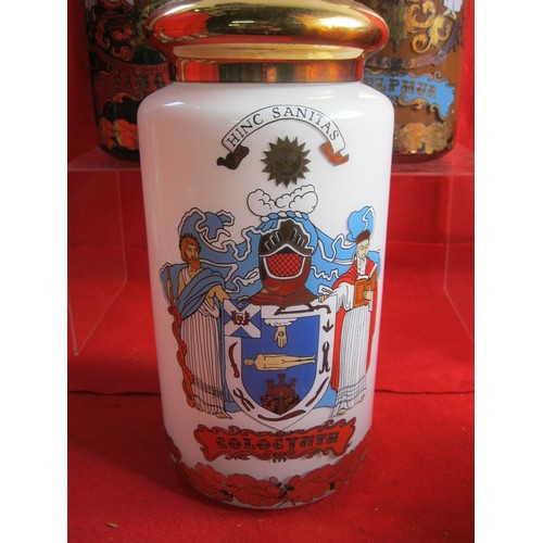 167 - A set of three Continental apothecary jars with brass lids, decorated to the front as pictured