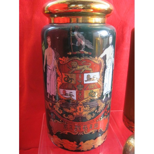 167 - A set of three Continental apothecary jars with brass lids, decorated to the front as pictured