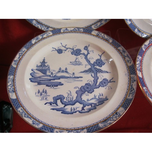 53 - Four  Mills and Sons Staffordshire  Pagoda Dinner Plates in fair used condition .
No Chips or crack ... 