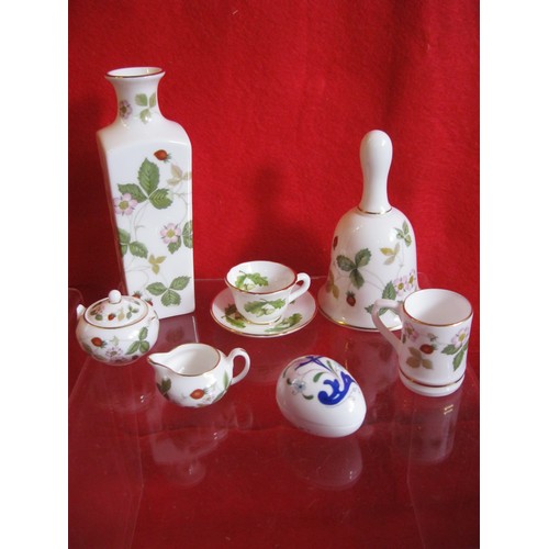 81 - A selection of mini cups saucers trinkets etc along with a Wedgwood Wild strawberry Vase and bell .