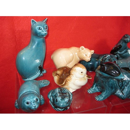 103 - A selection of Poole pottery Blue and Honey coloured animals including Badgers ,Cats ,Seal and Bears