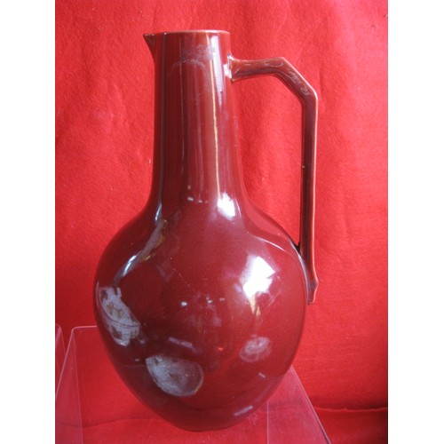 222 - Christopher Dresser for Samuel Lear, an Aesthetic Movement art pottery jug, circa 1880, bulbous shou... 