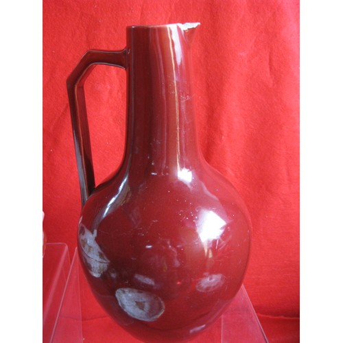 222 - Christopher Dresser for Samuel Lear, an Aesthetic Movement art pottery jug, circa 1880, bulbous shou... 