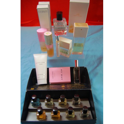 233 - A selection of Designer perfumes including Calvin Klein Eternity, plus body lotions and aftershave s... 