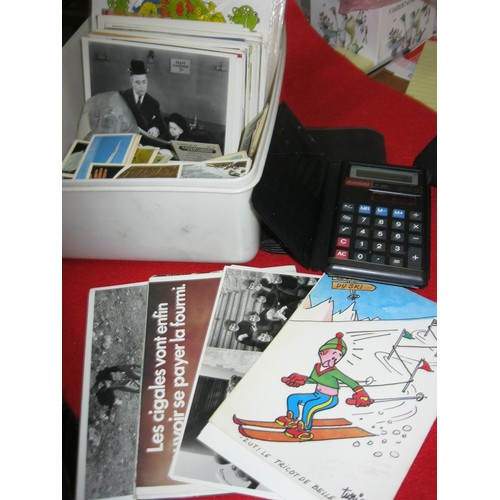 283 - A small tub containing cigarette cards, postcards and other items