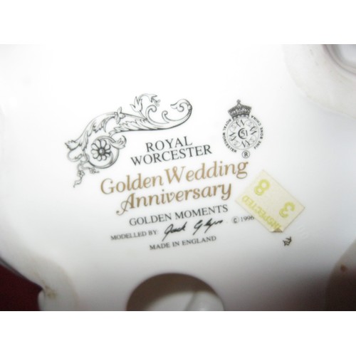 89 - A boxed Royal Worcester Golden Wedding Anniversary figure in good order