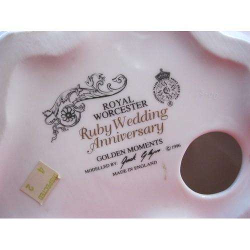 90 - A boxed Royal Worcester Ruby Wedding Anniversary figure in good order