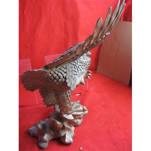 340 - A large carved wooden owl, some minor damage to wingtips (see pictures)