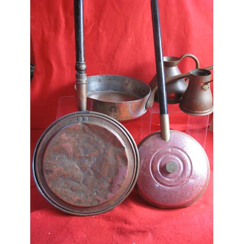 22 - An assortment of copper items including a vintage Leon Jaggi & Sons copper frying pan, bed pans etc