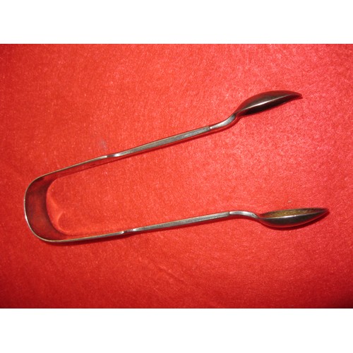 259 - A pair of Victorian silver sugar tongs hallmarked Edinburgh 1876, approx weight 60g