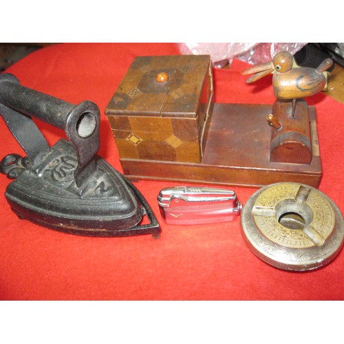 281 - A vintage bird cigarette box, a Ronson lighter, a white metal ashtray and a vintage trivet with iron