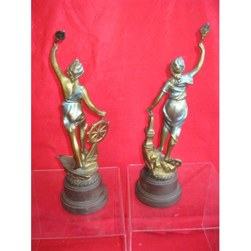 26 - A pair of figures in art deco style on bakelite or lucite bases