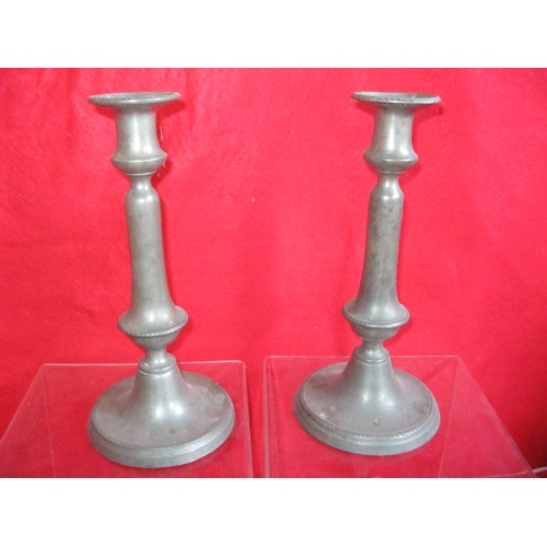 25 - A pair of vintage pewter candlesticks in good order