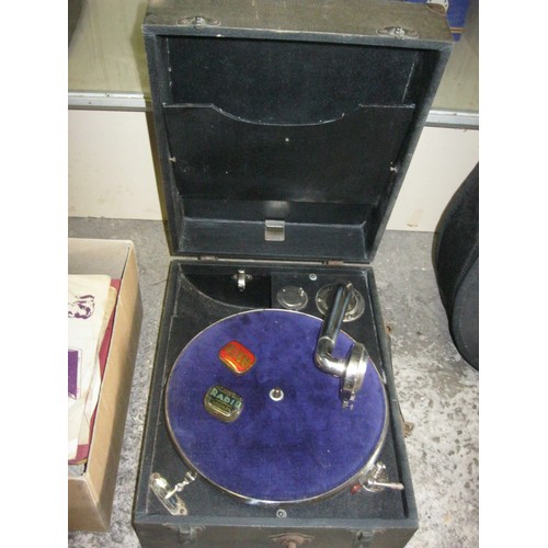 215 - A vintage wind up gramophone in working order plus a box of 78 rpm records