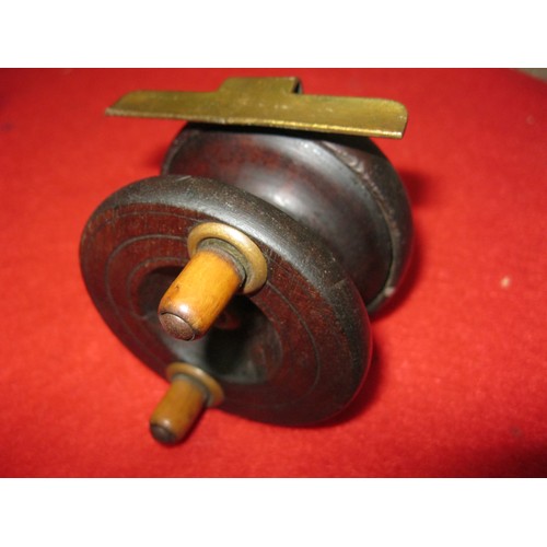 274 - A lovely antique wooden fishing reel with brass fittings, mechanism spins freely