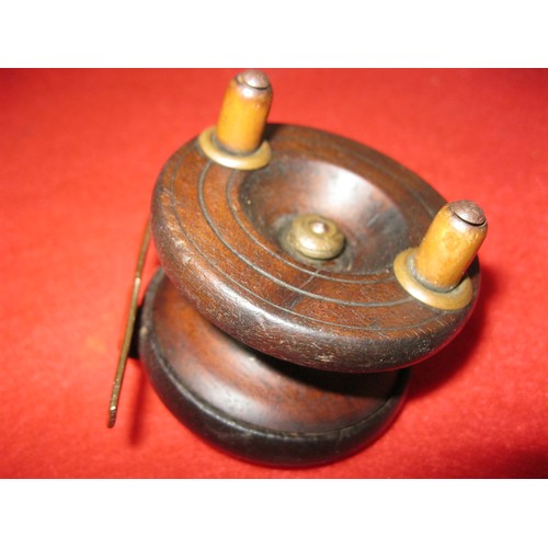 274 - A lovely antique wooden fishing reel with brass fittings, mechanism spins freely