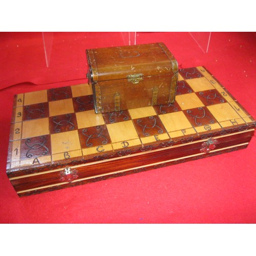 338 - A wooden Chess set and board, plus a music box in the form of a chest that plays 'You take the high ... 