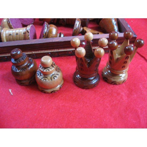 338 - A wooden Chess set and board, plus a music box in the form of a chest that plays 'You take the high ... 