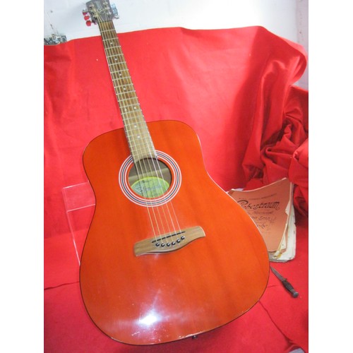 216 - An as-new Brunswick Guitar model number FWRED in original carry bag