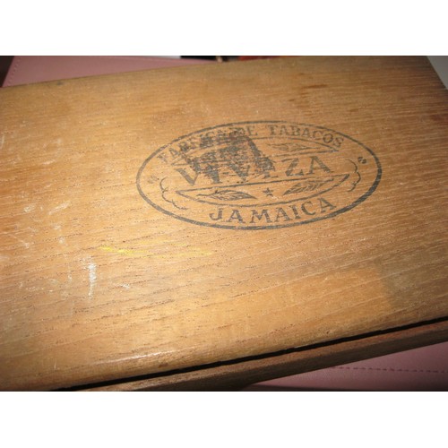 221 - A vintage cigar box containing interesting items including penknives