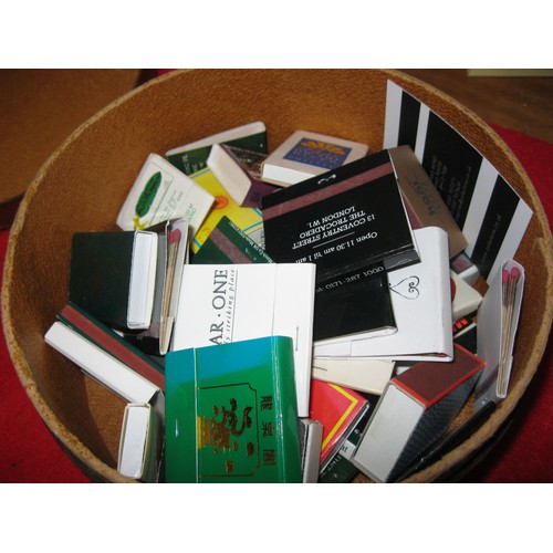 224 - A vintage collar box filled with matchbooks from around the world