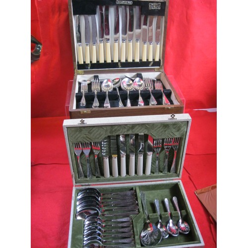 29 - A vintage cased set of Viner's cutlery in apparently unused condition plus two other boxed sets of c... 