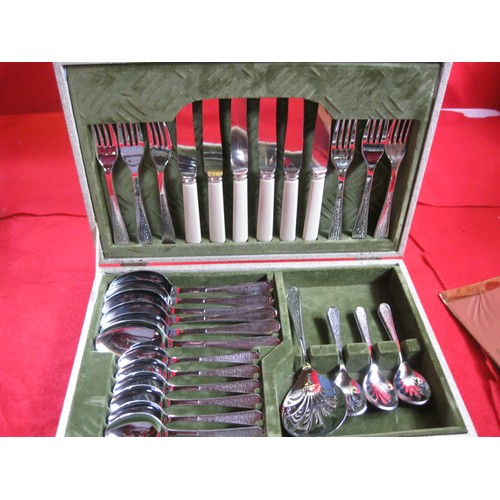 29 - A vintage cased set of Viner's cutlery in apparently unused condition plus two other boxed sets of c... 