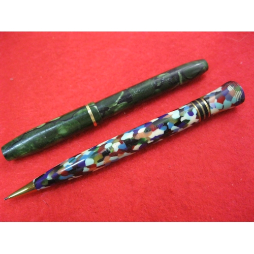 152 - A Conway Stewart Dinkie lever fill fountain pen in green, missing shirt clip fitting but otherwise c... 