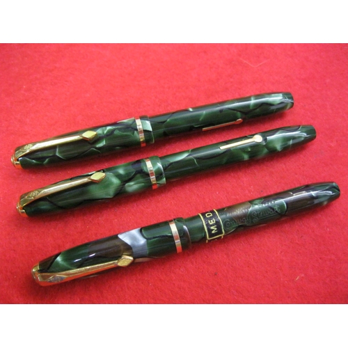 153 - 3 Conway Stewart Dinkie 550 lever fill fountain pens, all finished in green and in good order, all w... 