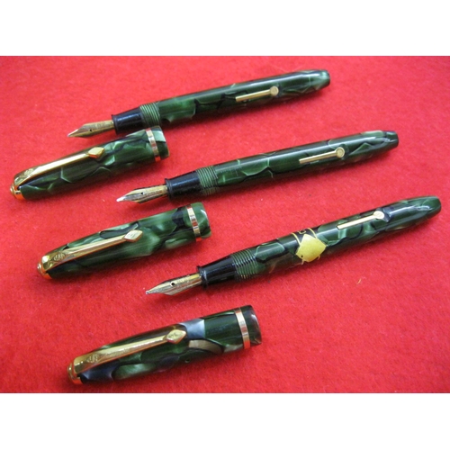 153 - 3 Conway Stewart Dinkie 550 lever fill fountain pens, all finished in green and in good order, all w... 