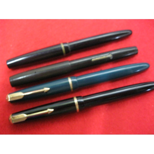 156 - 3 vintage Parker pens all with 14ct gold nibs, comprising a pair of Juniors (one missing shirt clip)... 