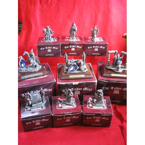 228 - An assortment of 9 Tudor Mint Myth & Magic Pewter figures, boxed, most with certificates, includes l... 