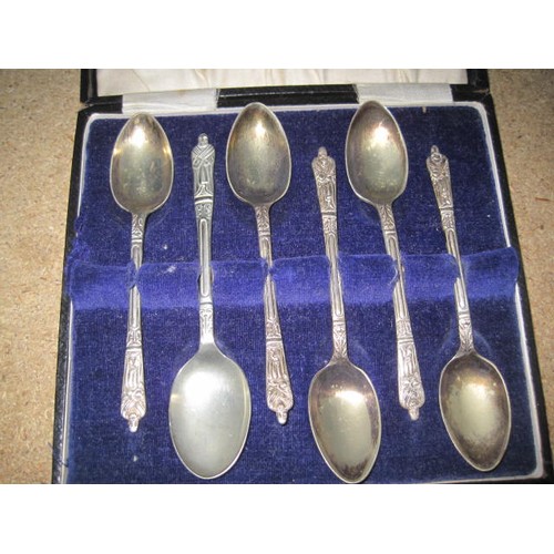 269 - A boxed set of six silver plated teaspoons along with two pickle forks and two smaller knifes all ma... 