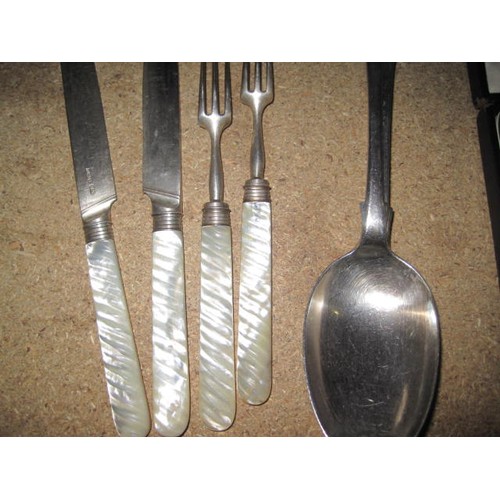 269 - A boxed set of six silver plated teaspoons along with two pickle forks and two smaller knifes all ma... 