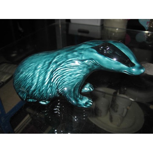 62 - A Poole Pottery Dolphin Blue Badger in Pristine condition.
Approx 5 inches long by 3 high