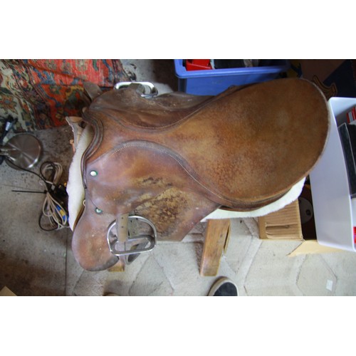 271 - Vintage saddle on stand, with unused tub of leather 'Genie Balsam'